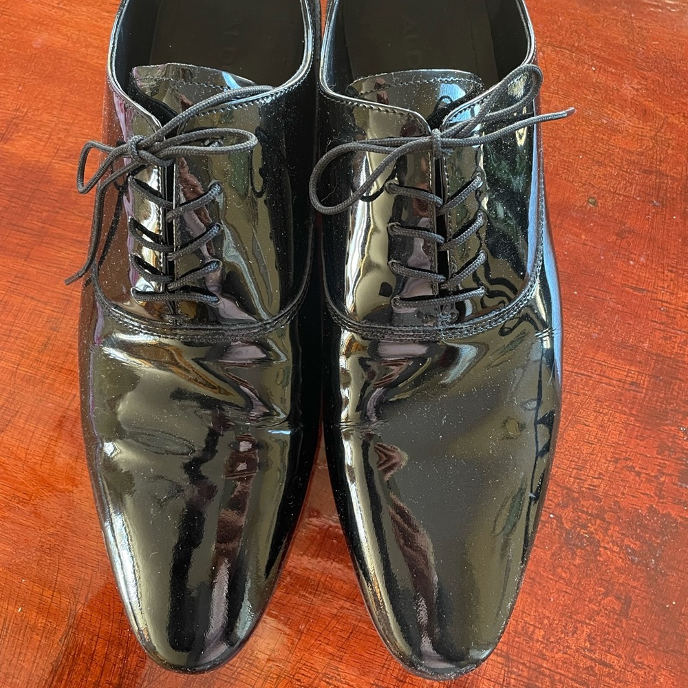 Men’s ALDO black patent dress shoes.Worn once. Perfect condition